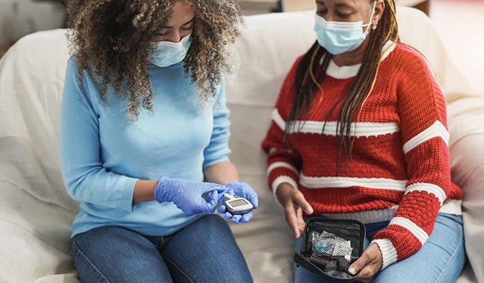 two girls wearing a  blue mask 